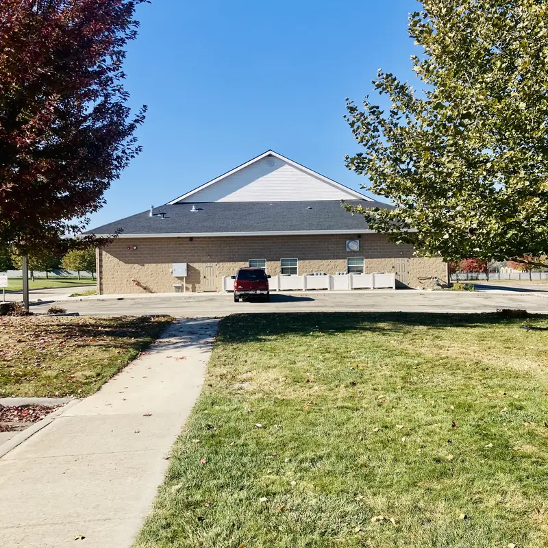 The walkway and lawn leading to Cornerstone Community Schoolhouse at 912 W Linden St in Caldwell, Idaho